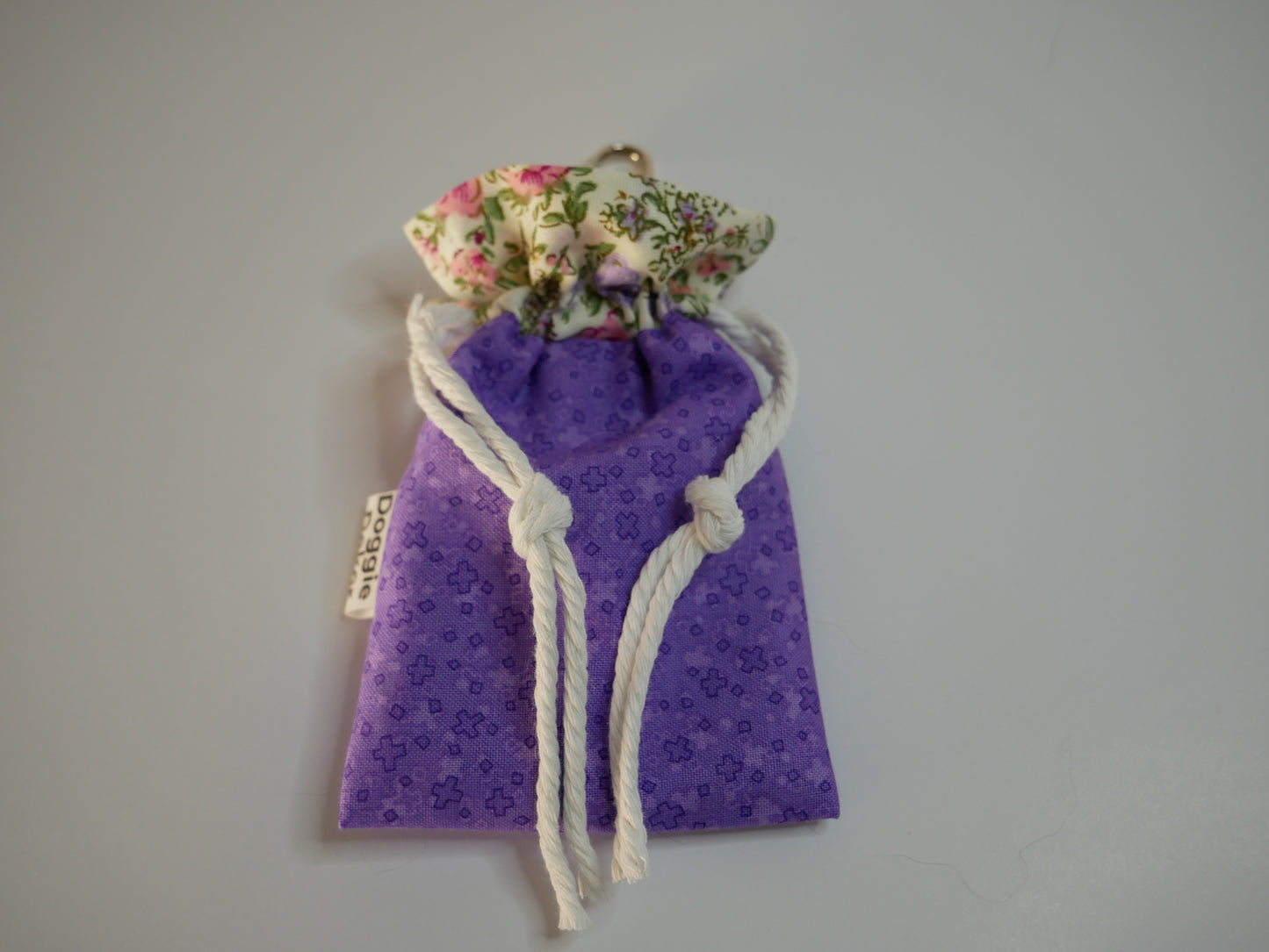 Dog poo bag holder - 100% cotton drawstring pouch in bright purple and a cream floral collar, white drawstring and metal clip - Doggie Dekor