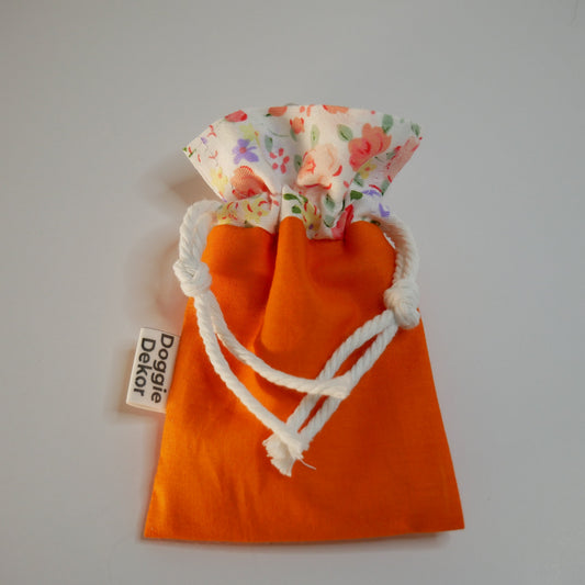 Dog poo bag holder - 100% cotton drawstring pouch in bright orange with a cream floral collar, white drawstring and metal clip - Doggie Dekor