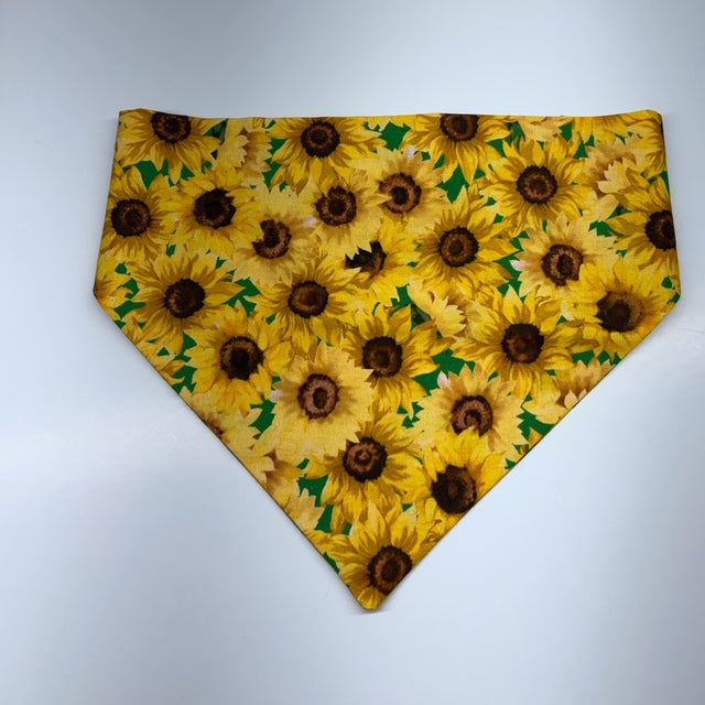 Sunflower patterned scrunchie bandana on a white background