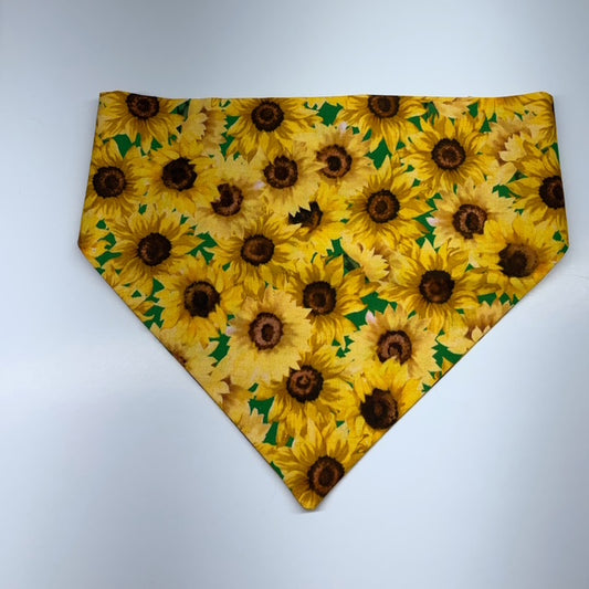 Sunflower patterned scrunchie bandana on a white background