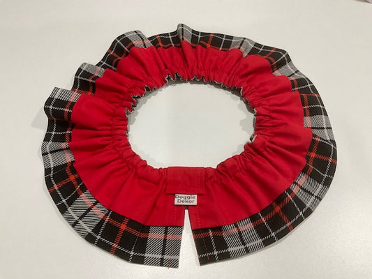 A black, white, and red plaid dog neck ruffle by Doggie Dekor, Calgary