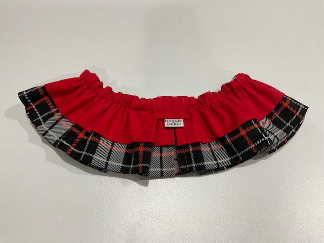 A black, white, and red plaid dog neck ruffle by Doggie Dekor, Calgary