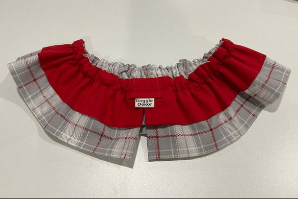 A red and gray plaid dog neck ruffle by Doggie Dekor, Calgary. 