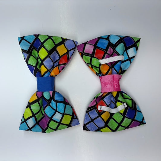 Bright patterned bow tie on a white background