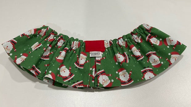 A classic style Neck Ruffle by Doggie Dekor in Calgary featuring a red green and white chubby santa fabric.