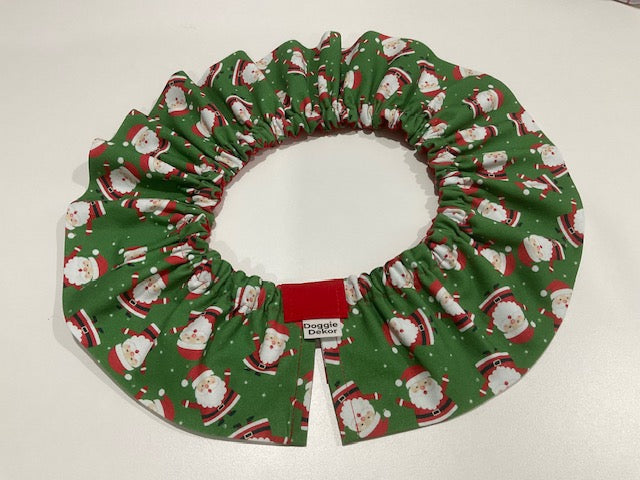 A classic style Neck Ruffle by Doggie Dekor in Calgary featuring a red green and white chubby santa fabric.