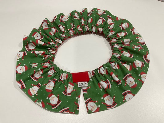 A classic style Neck Ruffle by Doggie Dekor in Calgary featuring a red green and white chubby santa fabric.