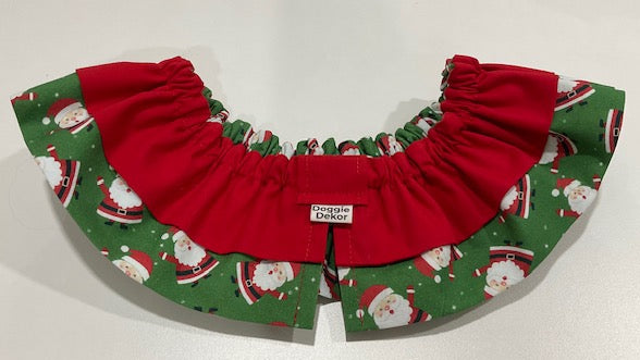Premium neck ruffle for a dog in a chubby santa fabric print with a red ruffle overlay.